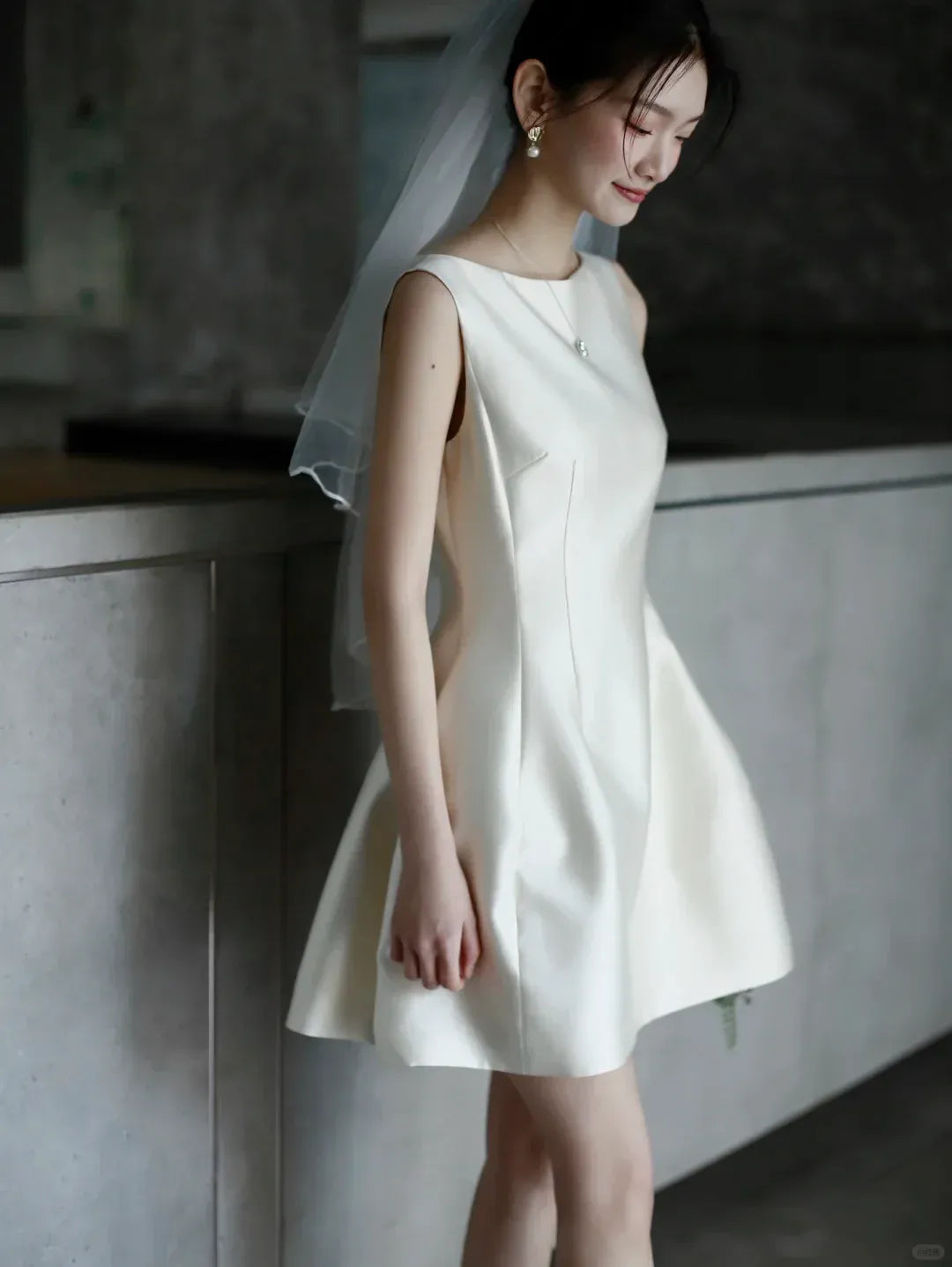 Elegant satin A-line boat-neck sleeveless mini wedding dress